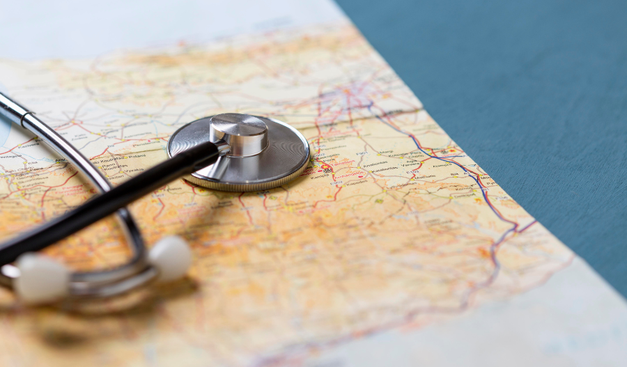 Healthcare CRM System - A stethoscope laid on a world map