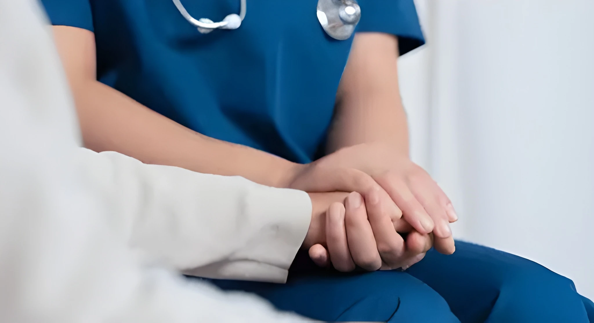 female nurse caregiver holds hands 260nw 2532956617 (1) (1) (1)